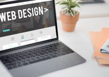 "Web design and development concept showing responsive website layout on multiple devices for businesses in Dubai"